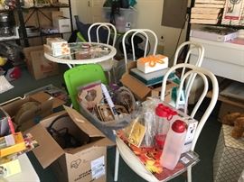 Several outdoor table sets. And various household items.