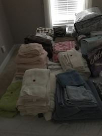 Various linens. Towels, curtains, bedding, table cloths, placemats etc.