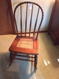 Antique Cane Rocking Chair.