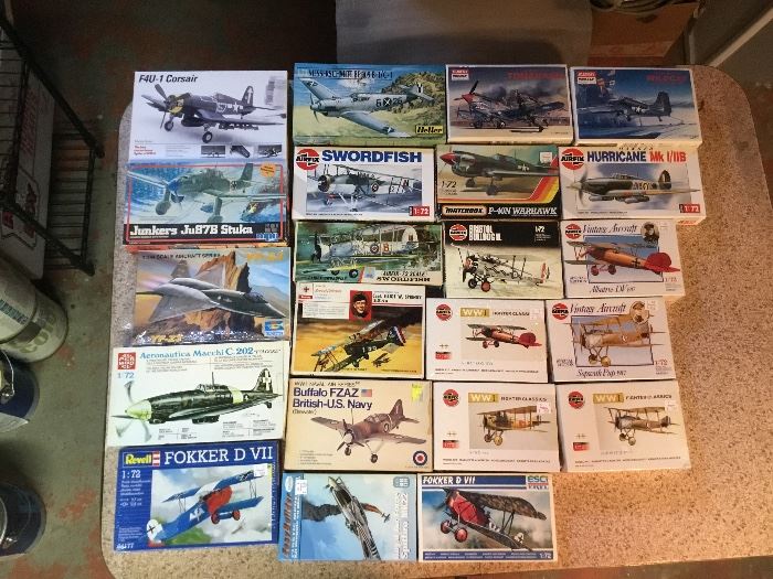 Unassembled air plane model kits in their original boxes