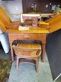 Great shape sewing machine and table.  I would used a desk as well.  
