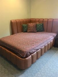Queen corner bed with built in leather headboard 