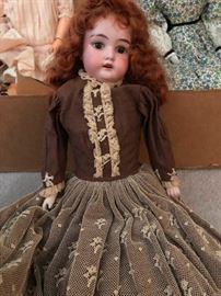 antique bisque porcelain head Doll with jointed leather body