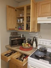 Toaster oven, glasses, dishes, siverware, kithen utensils