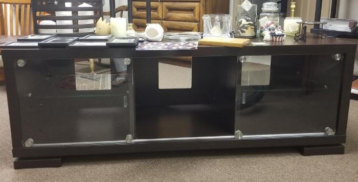 Dark brown glass shelf tv stand