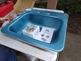 Brand New Stainless Steel Drop in Sink with a Brand New Faucet, Drain and mounting hardware, Still has the protective blue plastic on the sink