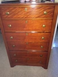 Tall chest of drawers