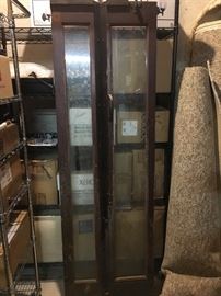 Glass doors for telephone booth