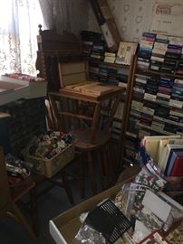 VHS and DVD collection on 4 + shelves