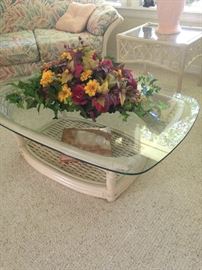 Glass top rattan coffee table