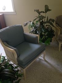 Wicker chair with pale blue upholstery