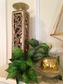 One of two tall candle holders and small gold candle holders