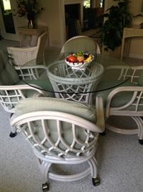Glass top rattan breakfast table and four chairs