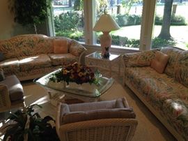 Variety of rattan furniture . . .come, sit, and enjoy the golf course view!