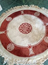 Asian rug (about 4 feet 6 inches in diameter)