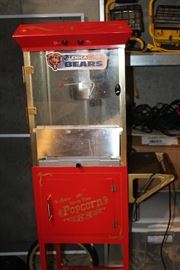 This is a popcorn machine cart that will look terrific once it's cleaned