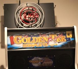 Above this arcade is a neon Chicago CUBS LIGHT - but I cannot squeeze in there to reach the plug, dang it!