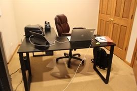 Desk and Chair - the computers, etc. are not included.