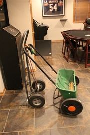 why the spreader is in the basement, I have no idea. looks like a hand truck too.