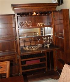 This is an AWESOME bar; - the doors open flat but the wall is in the way on the right. A total blend of form and function - you'll love it.