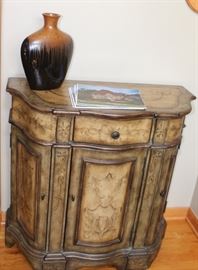 This is a foyer cabinet, part of the Seven Seas by Hooker collection. Nice storage -