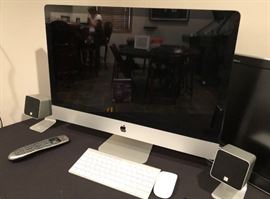 imac with keyboard and speaers