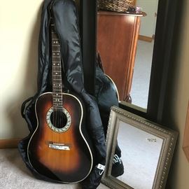 Accoustic Guitar by Ovation. May need a repair.