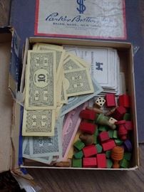Vintage Monopoly game w/wood  playing pieces  and hotels, etc.