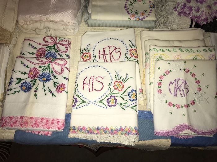 Vintage linens, pairs of stitched pillow cases