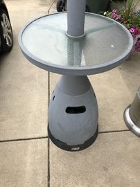 1 of 2 outdoor patio gas heaters - this one has a small table built in