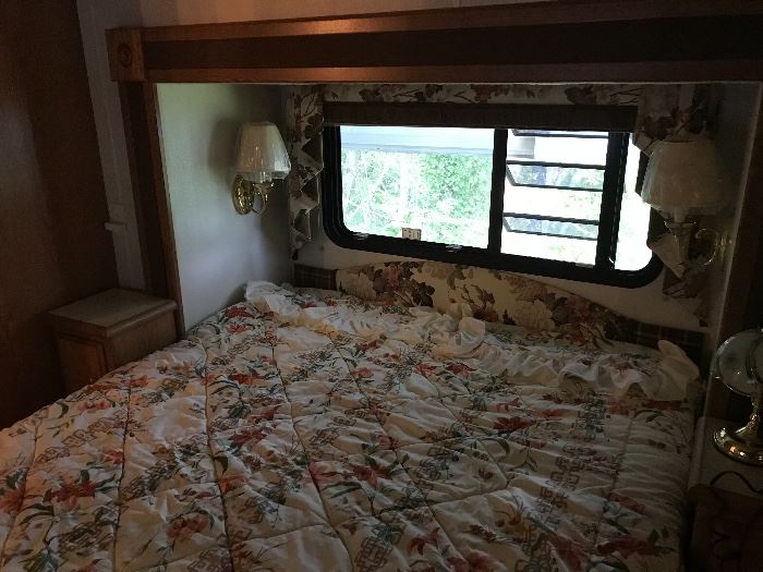 Queen bed extended in Holiday Rambler