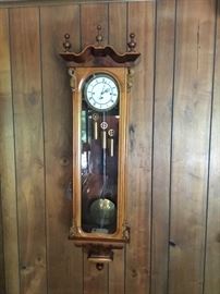 Antique Biedermeier/ Biedermeier copy  wall clock. Not working. Stunning burled and carved case. Finials and scrolls.  Brass pendulum and weights. 