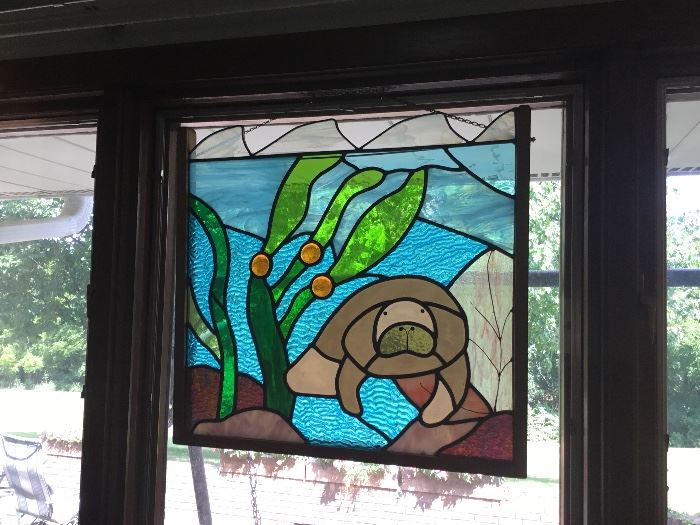 Beautiful manatee stained glass window 