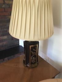 Vintage 3 way touch lamp. Gorgeous pleated silk shade. Base is metal with Asian influence.  One of a pair.  