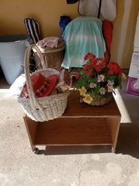 Rolling cart; decorative baskets.
