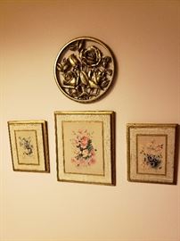 Cute grouping of framed floral prints and brass plaque.