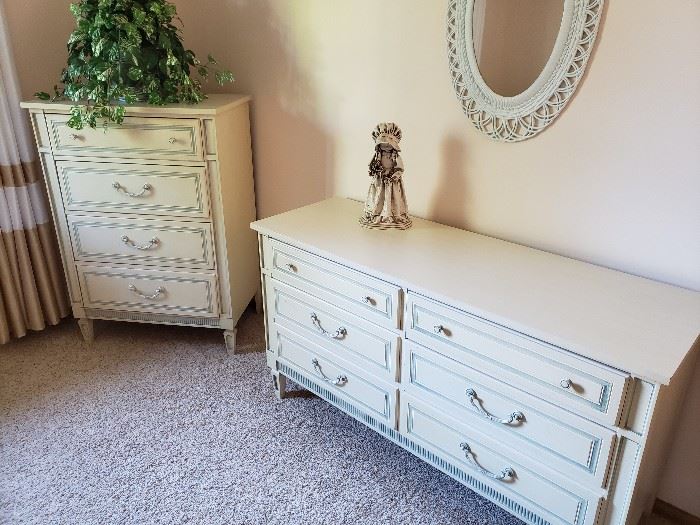 Matching highboy and low dresser; decor and wall mirror.