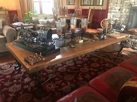 Lot 65: Oversized Coffee Table with Hand-Forged Iron base, Stone & Glass Top