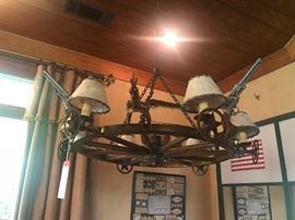 Lot 91A: Texas Wagon Wheel & Iron Chandelier with Gun & Spur Motif