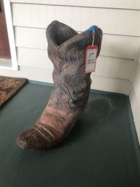 Lot 104: Three Large Concrete Boot Planters (Note: photo shows only 1 of 3 planters, but three are included in the lot)