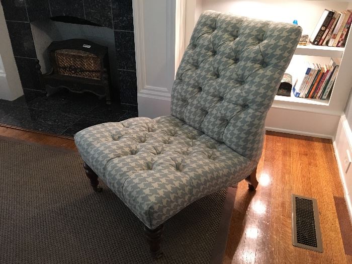 Tufted occasional chairs with front casters