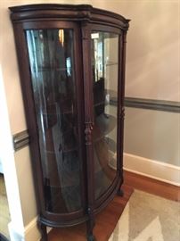 Antique curved glass curio cabinet ($360)