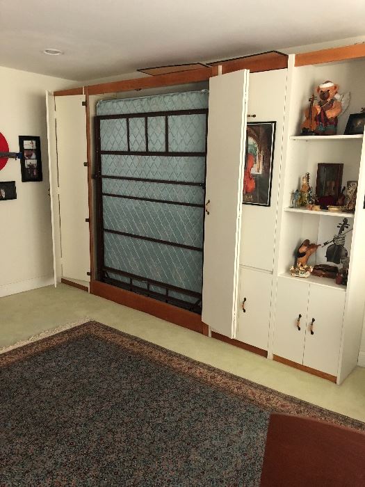 White queen size Murphy bed - mattress is upgraded - attaches to wall - panel to the right is a desk. $1000 - must have licensed person remove,  Please call me if you would like this item earlier.