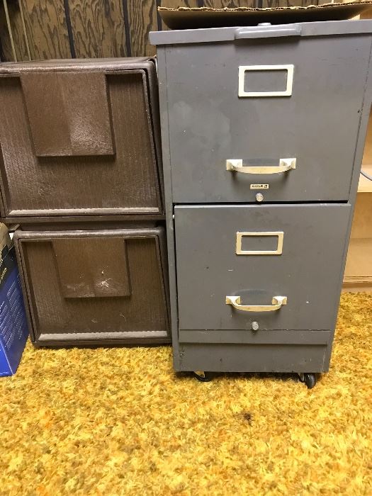 Two drawer file cabinets. One metal. One sturdy plastic.  Both are letter size. 