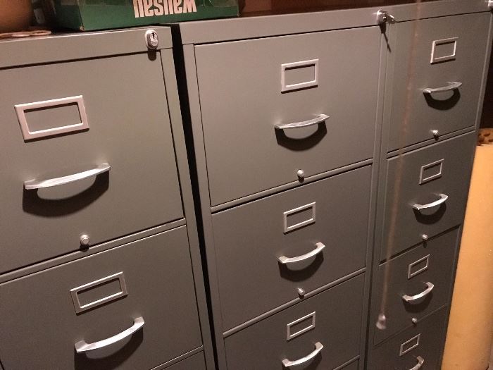 Four drawer letter and legal size file cabinets. Excellent condition. 