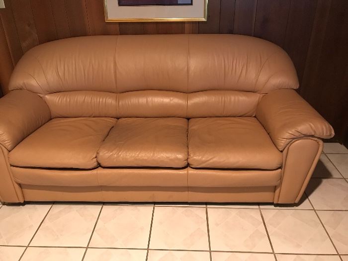 Tan leather comfortable sofa. 
