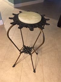 Vintage metal plant stand with marble top