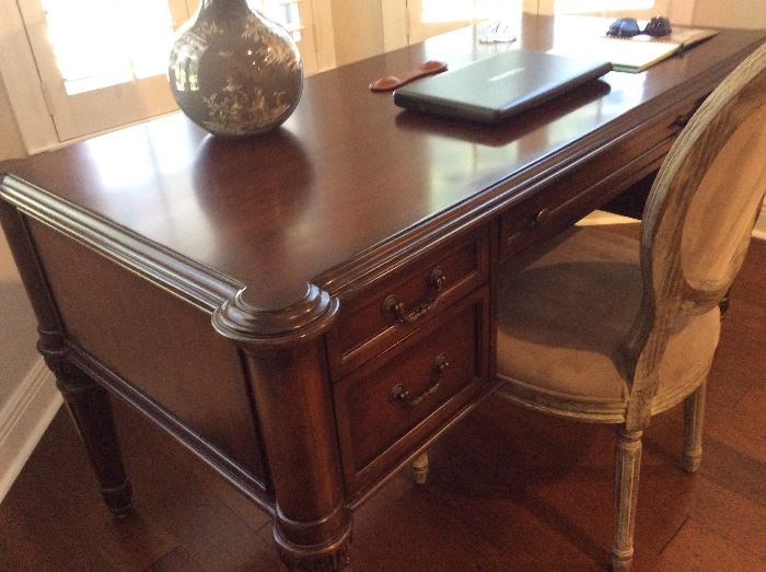 Ethan Allen mahogany desk & chair. Measures 60" x 30"