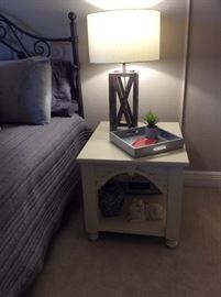 Off-white wood nightstand Measures 22" x 27"