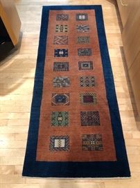 Beautiful wool rug. 75” x 24 1/2”
